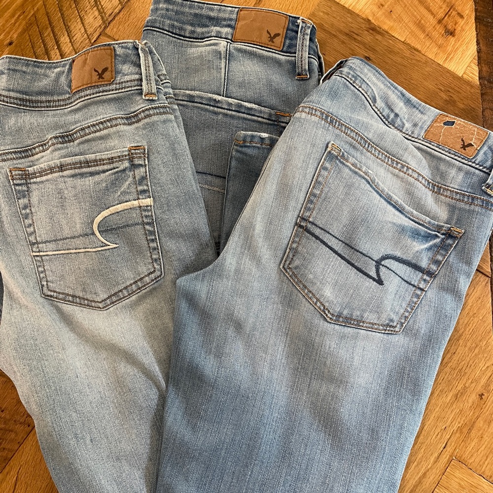 Three pairs of American Eagle Jeans